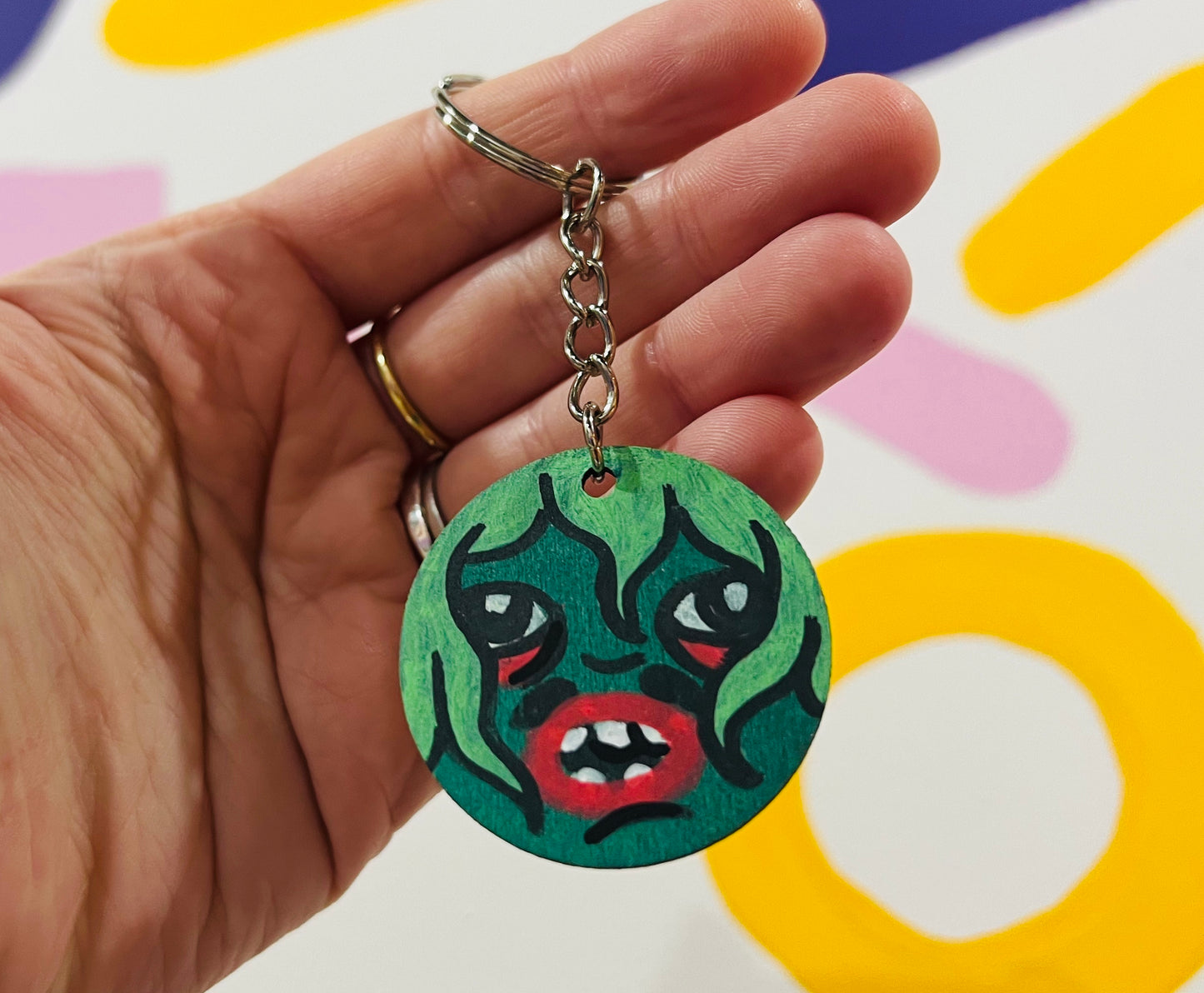 Hand painted Old Gregg inspired wooden 4cm keyring