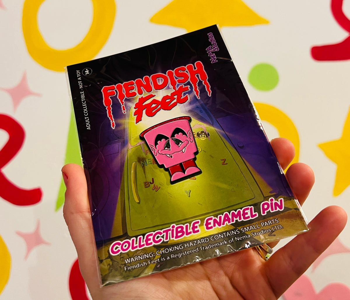 Fiendish Feet - Fangs-A-Lot enamel pin