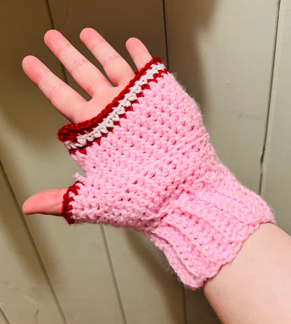 Mr Blobby themed crocheted gloves on a string