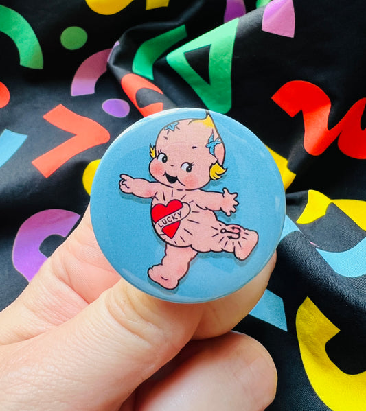 Tattooed Kewpie button inspired Badge