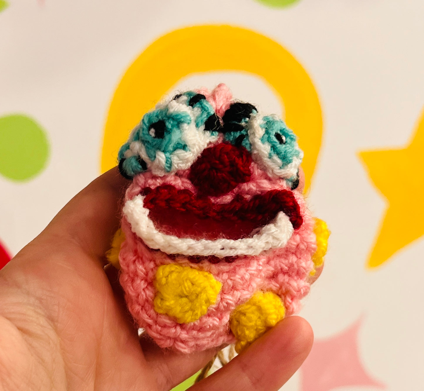 Mr Blobby themed crocheted keyring pouch for earphones