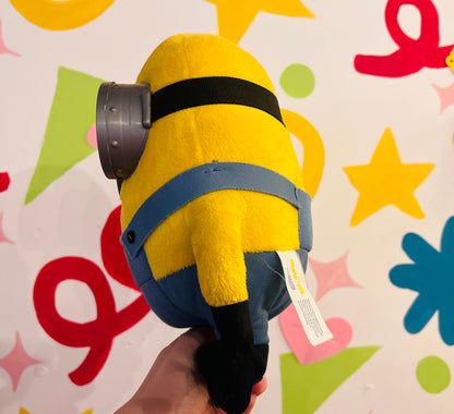 Minions plush toy holding teddy