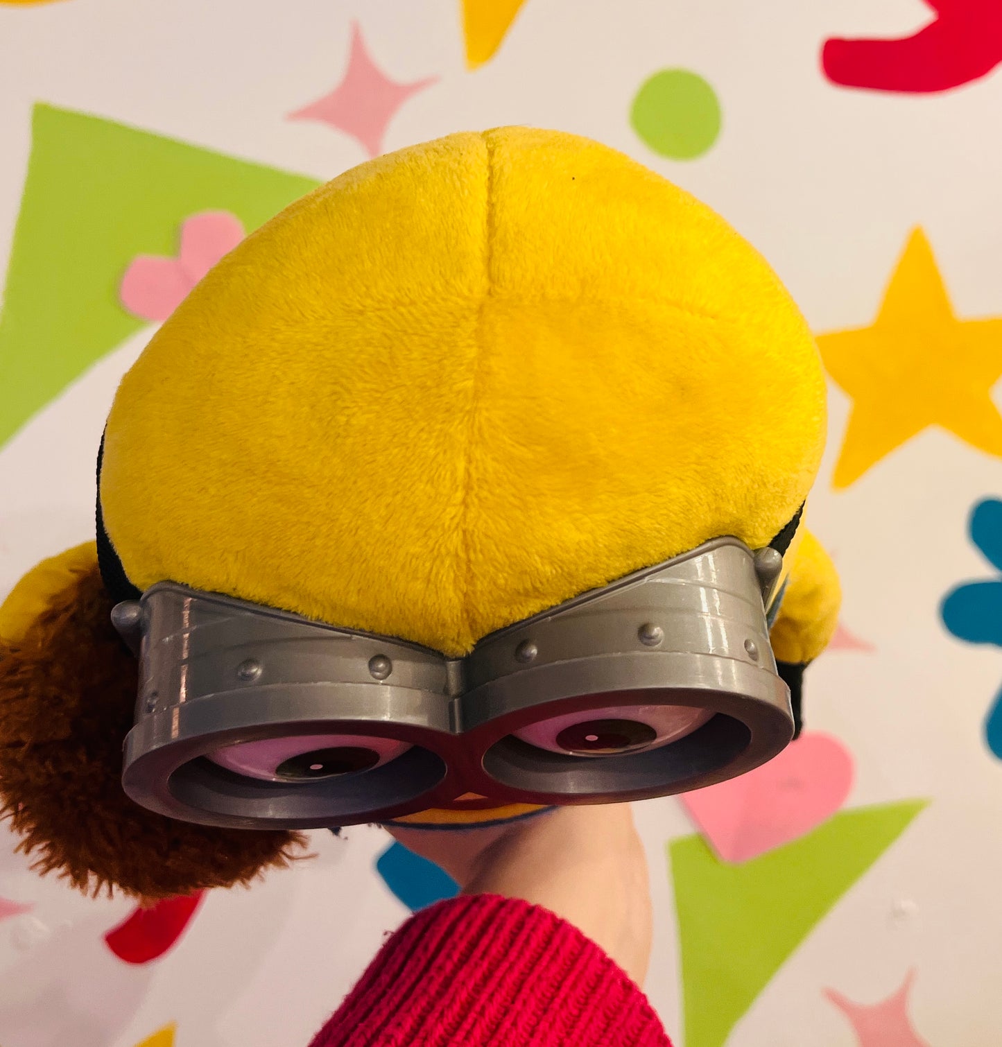 Minions plush toy holding teddy