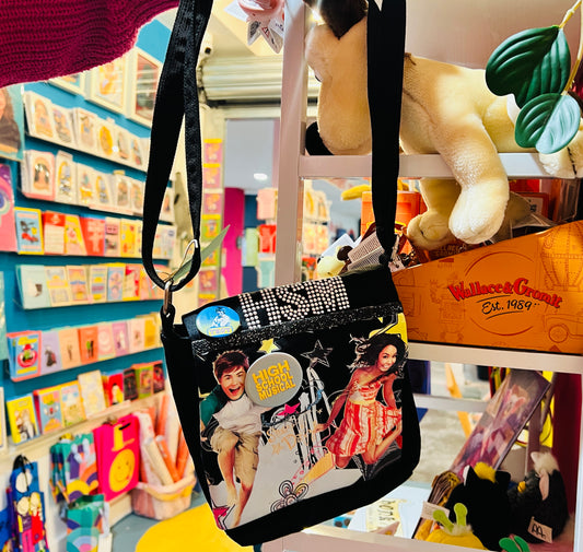 Original black High School Musical shoulder bag with original badges