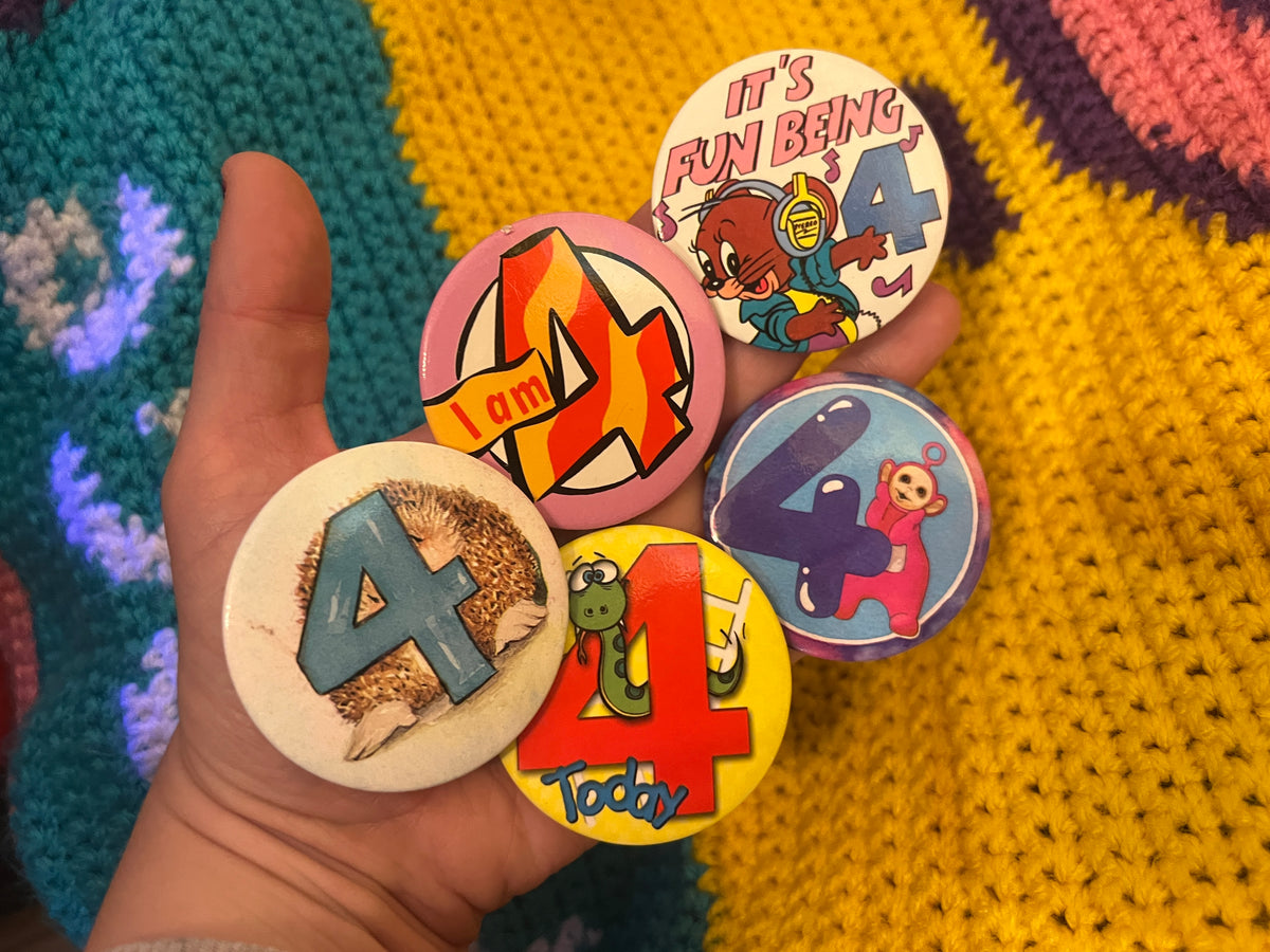 Number 4 vintage Badges